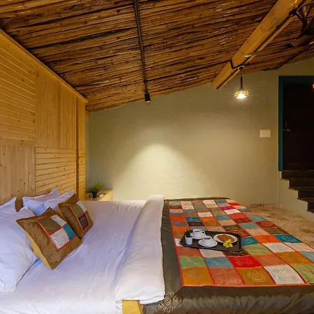 Stayvista's Ficus Farms: Mountain-View Retreat with Rustic Charm & Entertainment-3